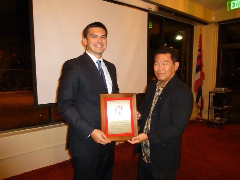 Larry Martin and Dr. Wayne Shiroma with the Outstanding Chapter Award